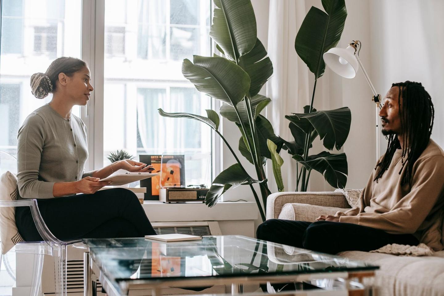 A therapist and client in a warm, culturally competent counseling session